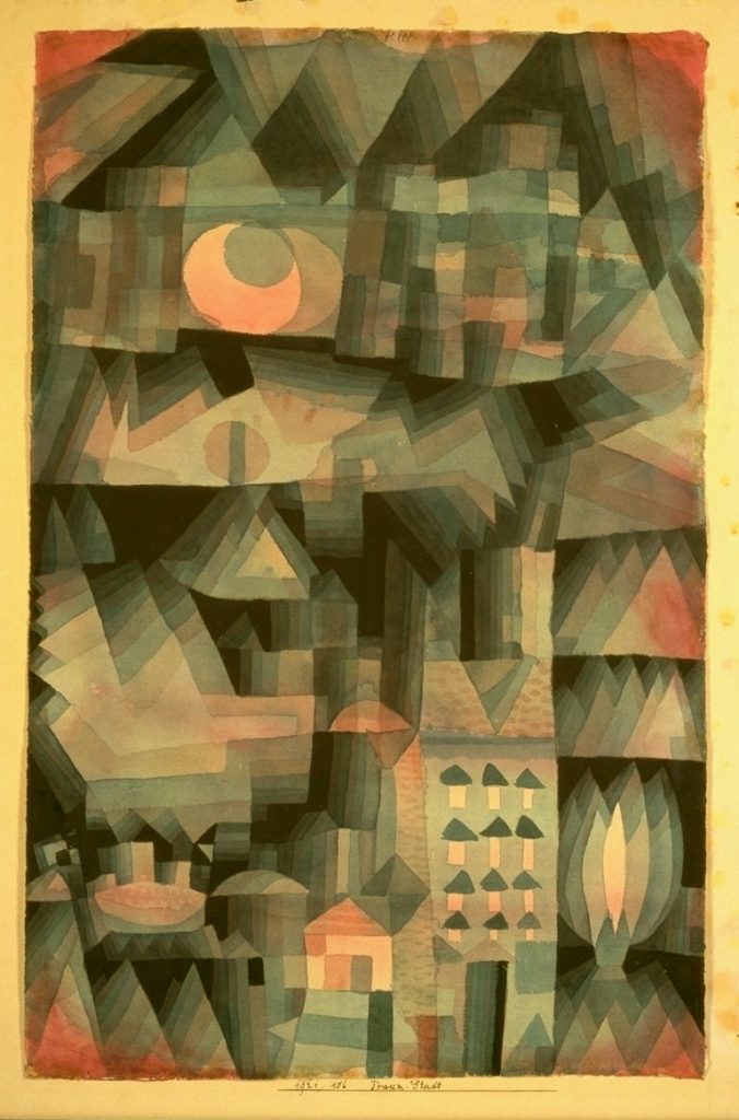 Abstract painting with colorful geometric shapes representing a city and mountains.