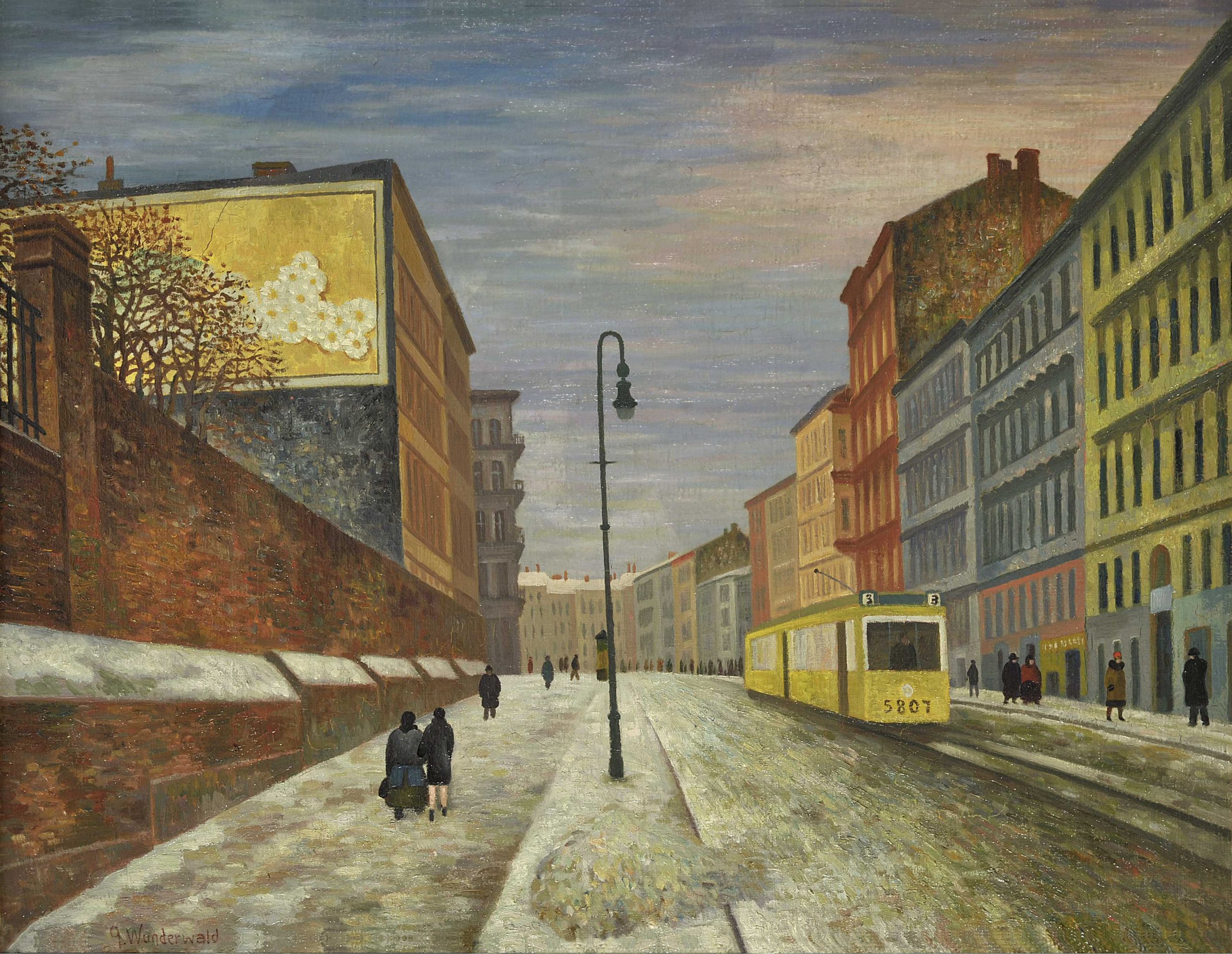 A snowy street scene featuring people walking along the sidewalk and a tram marked 5807 traveling down the road. The buildings and a streetlamp line the sides of the street.